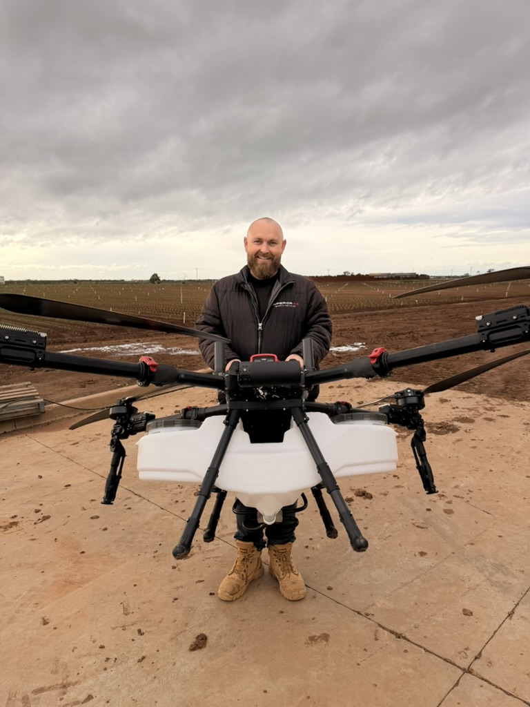 XAG agricultural spraying drone operating over an Australian field